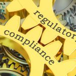 regulatory compliance concept on the gearwheels